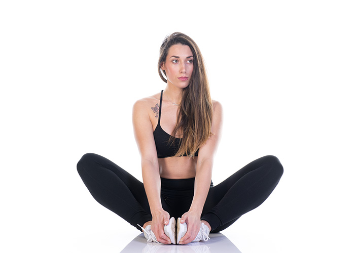 Pilates: fai il Rowing back sul Reformer per modellare tutto il corpo